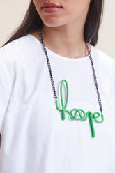 Green leather women's short with distinctive hope-link metal necklace